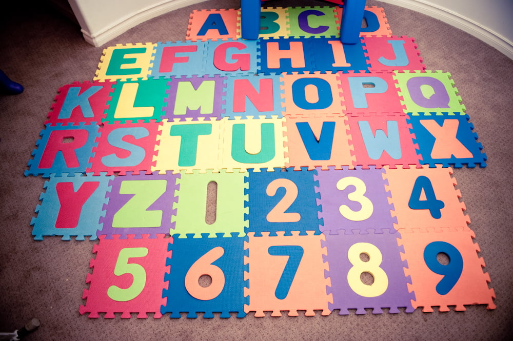 A foam alphabet and number floor mat